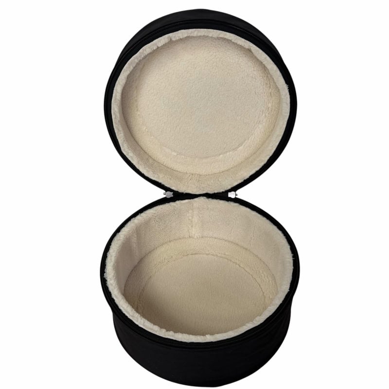 Soft drumstick case with plush interior for protection and storage.