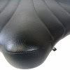 Drum throne seat with black leather upholstery, designed for comfort during drumming sessions.