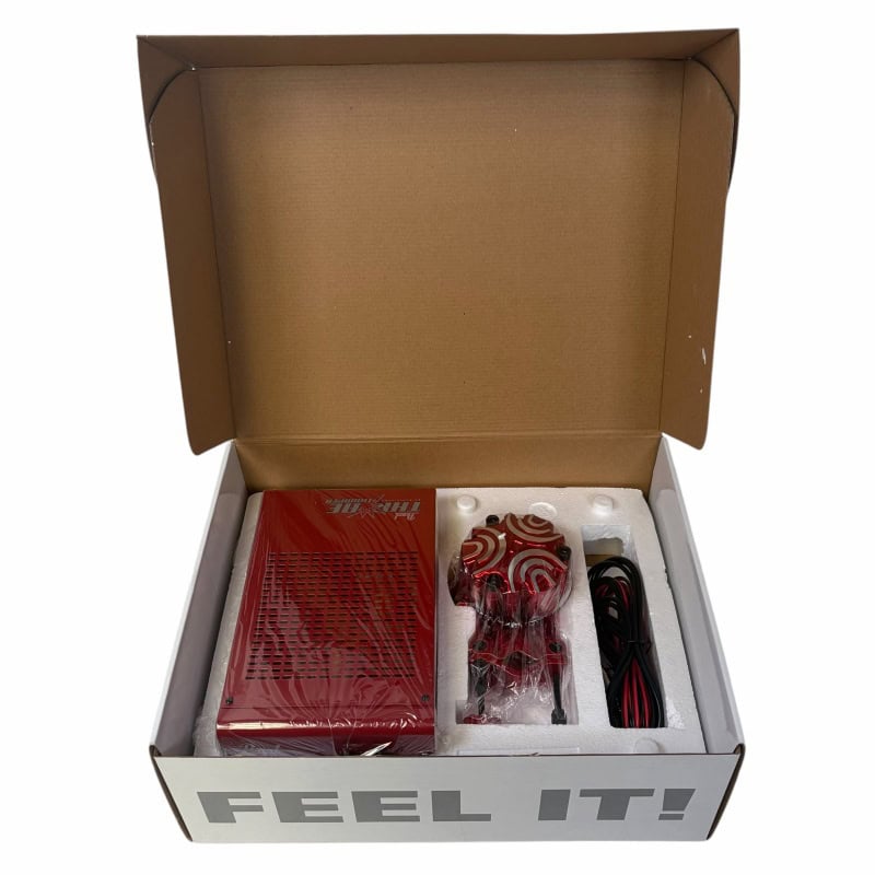 Electronic drum kit accessories in packaging, including cables and drum pads.