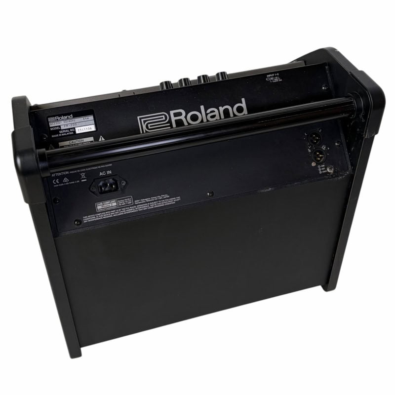 Roland electronic drum module for professional drumming and live performances.