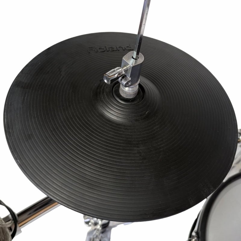 Close-up of a black cymbal on a drum kit, highlighting professional percussion equipment for drummer.