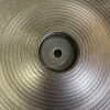 Close-up of a drum practice pad with concentric circles for drumming practice.