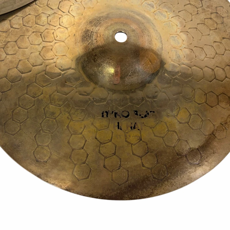 Cymbal from Drummers Only featuring a hexagonal textured surface and central hole, ideal for percuss.