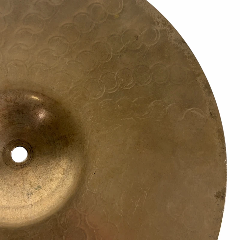 Cymbal close-up shot highlighting the textured surface and metallic finish.