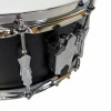 Close-up of a snare drum with drum latch and hardware details.