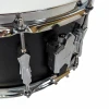 Close-up of a snare drum with drum latch and hardware details.