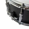 Close-up of a black drum with chrome hardware, showcasing detailed drum lugs and tension rods.