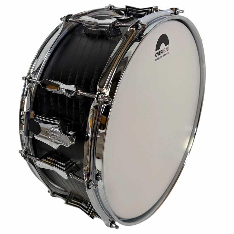 Bass drum for drummers, featuring Overead branding, black shell with chrome hardware, ideal for perc.
