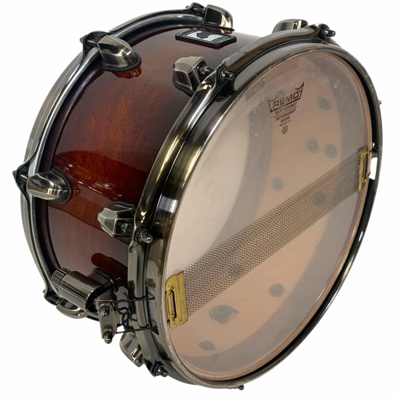 Professional drum snare with mesh head for dynamic percussion sounds.