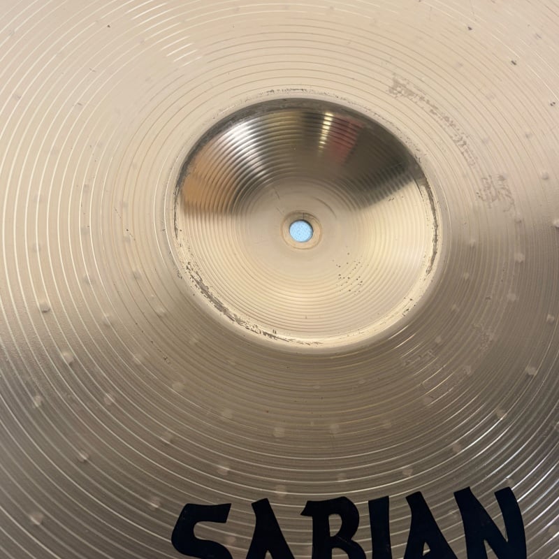 Drummers Only logo engraved on a shiny drum cymbal surface.