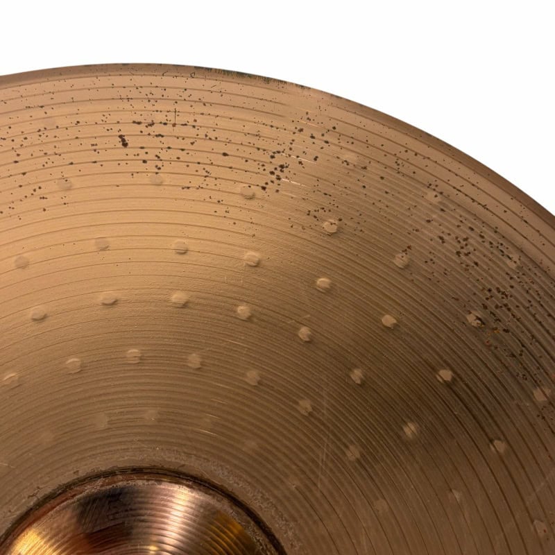 Close-up of a well-used cymbal showcasing drum kit equipment for professional drummers.