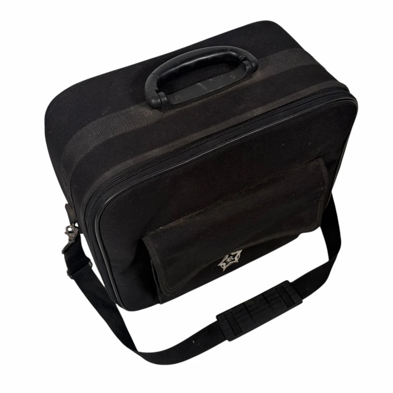 Durable black drumstick bag with handle and shoulder strap.