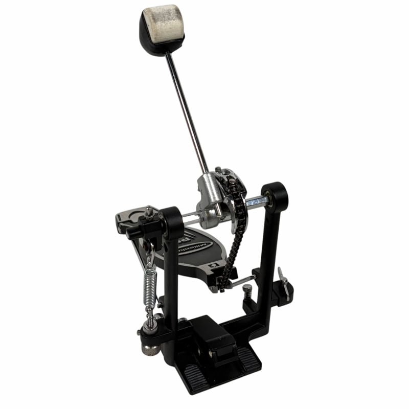 Practice drum pedal with drumstick for drumming practice.