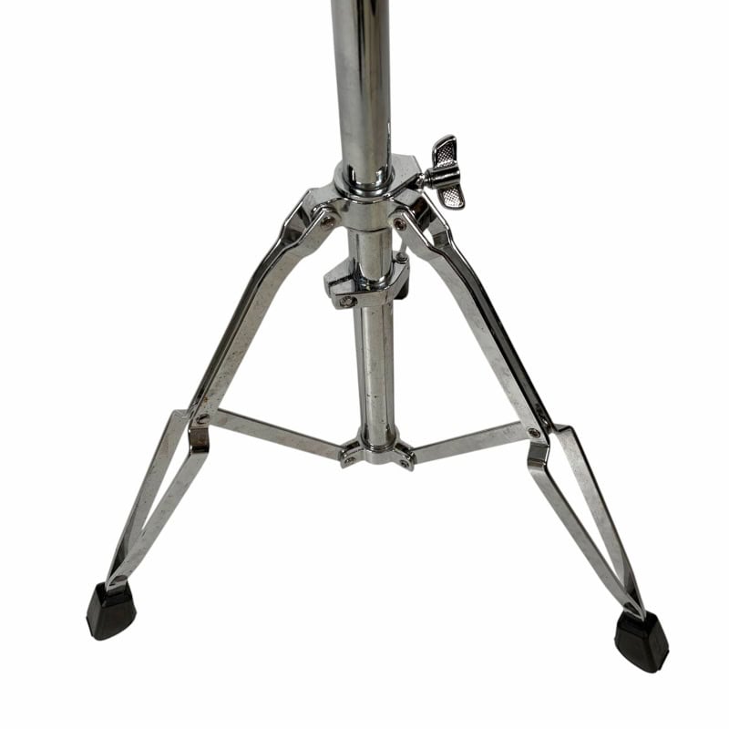 Metal drum stand for percussion instruments, adjustable height, sturdy tripod base.