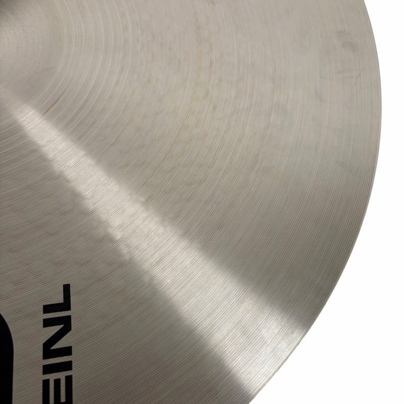 Close-up of a cymbal with Drummers Only logo, highlighting professional drum equipment.