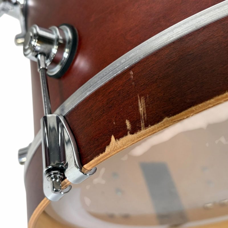 Richmond drum kit featuring polished wood finish and chrome hardware. Perfect for professional drumm.