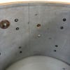 Close-up of Gretsch USA drum shell with mounting holes and hardware.