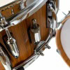 Close-up of a Sonor Vintage Series drum with wood finish and chrome hardware.