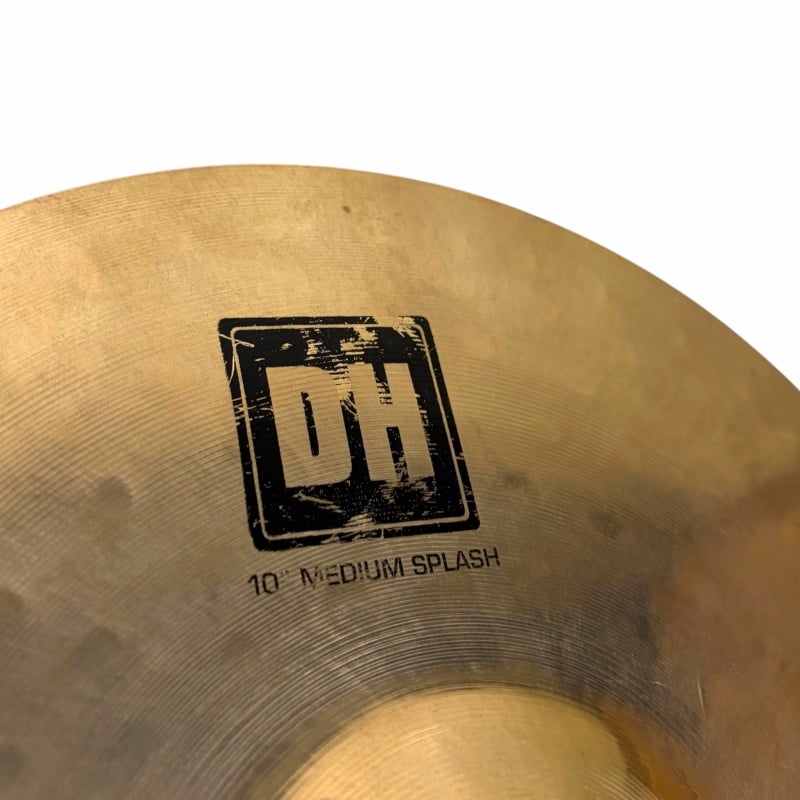 Drummers Only logo on a cymbal, music equipment for drummers.