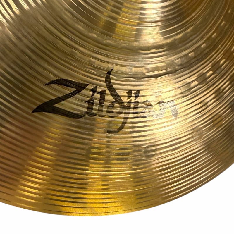 Gold cymbal with Drummers Only logo in black.