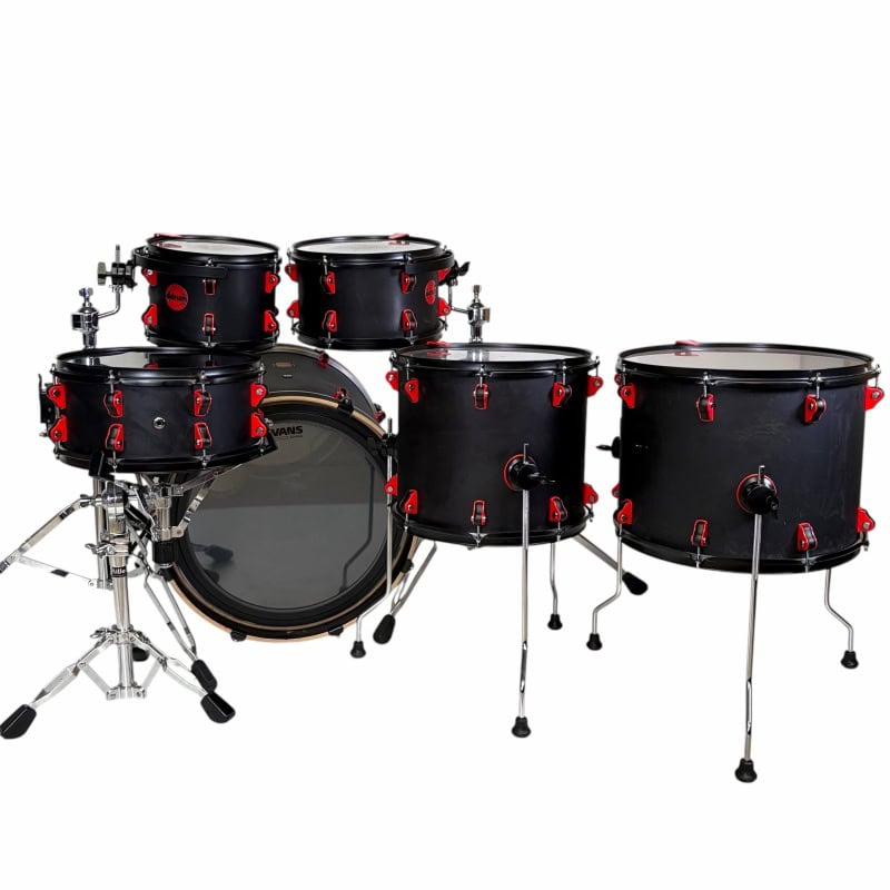 Professional black drum set with red hardware, perfect for drummers and music studios.