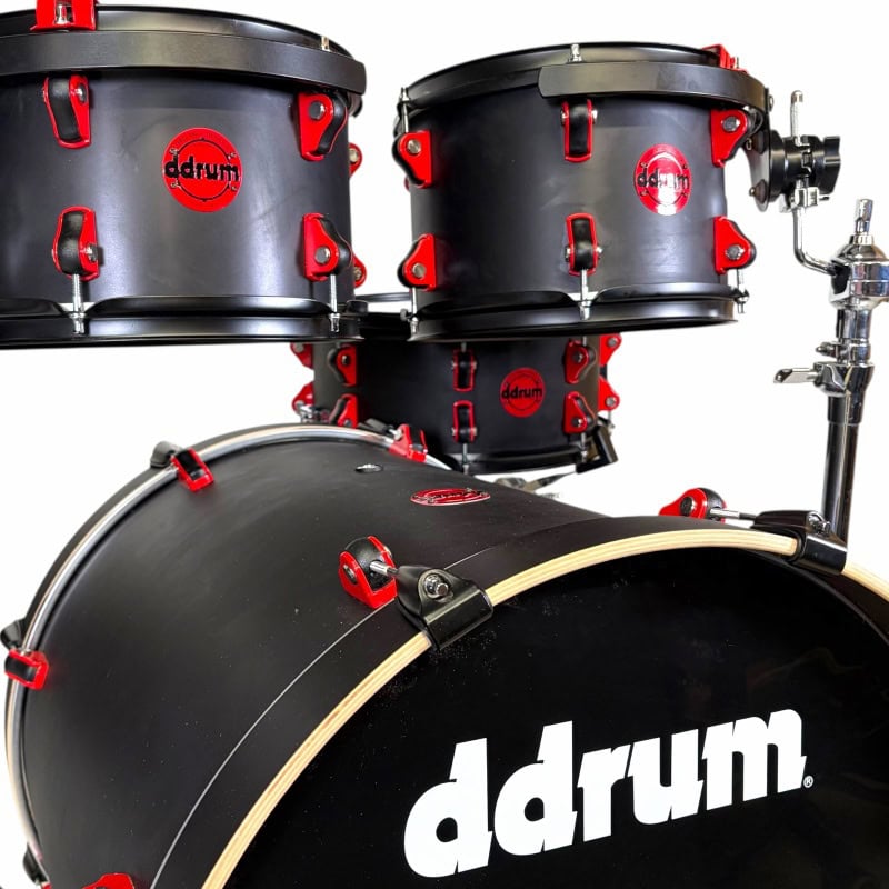 Drummers Only professional drum kit with black shells and red hardware.