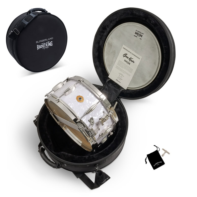 Snare drum in protective case with drumsticks and accessories for drumming enthusiasts.