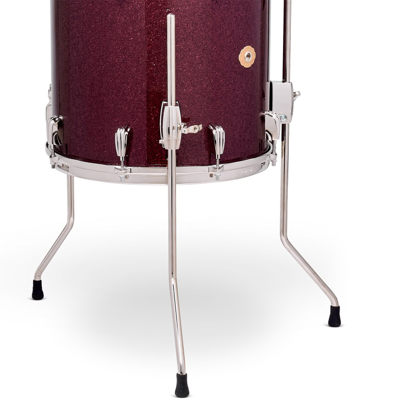 High-quality red snare drum with chrome hardware and sturdy stand.