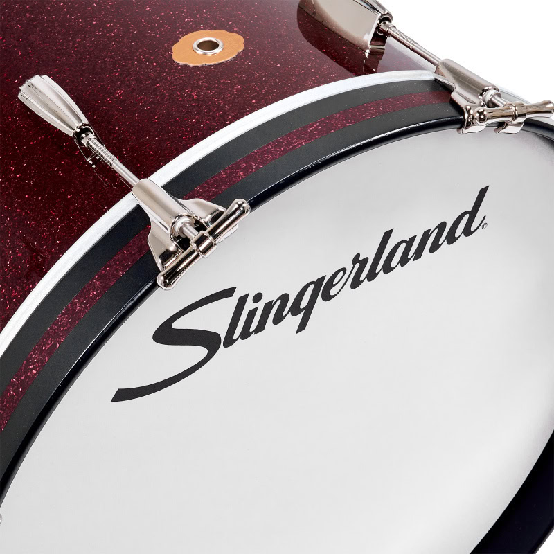 Slingerland bass drum with drumsticks and hardware, perfect for drumming enthusiasts.
