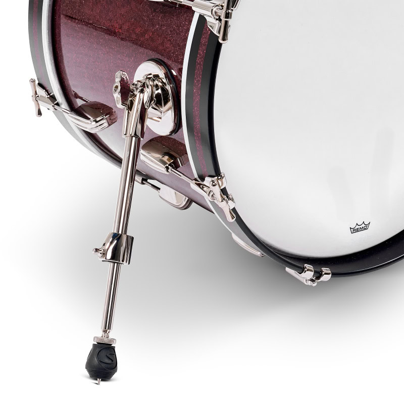 Drum kit with stand, focusing on bass drum and hardware, ideal for drummers and percussion enthusias.