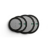 Set of four drum practice pads with black and white checkered surface for drumming practice.