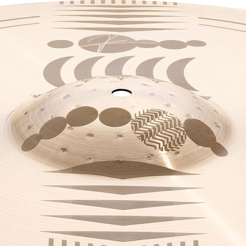 Handpan drum with geometric patterns, used for percussion and musical performances.