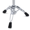 Drum snare stand for DW 9000X Series drums with adjustable legs and rubber feet.
