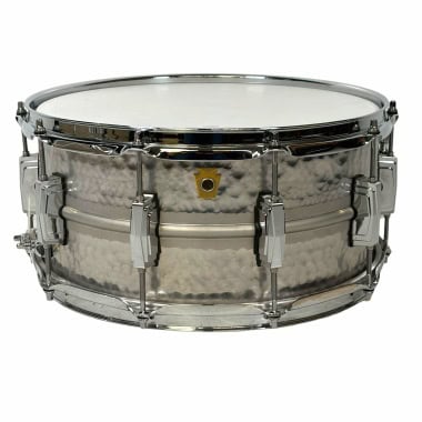 Snare drum with chrome hardware and white batter head, ideal for drummers and percussionists.