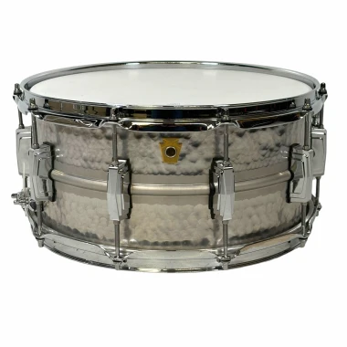 Snare drum with chrome hardware and white batter head, ideal for drummers and percussionists.
