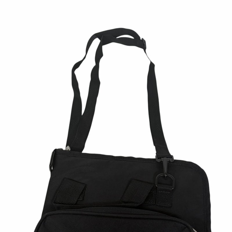 Black drumstick bag with adjustable strap for drummers.