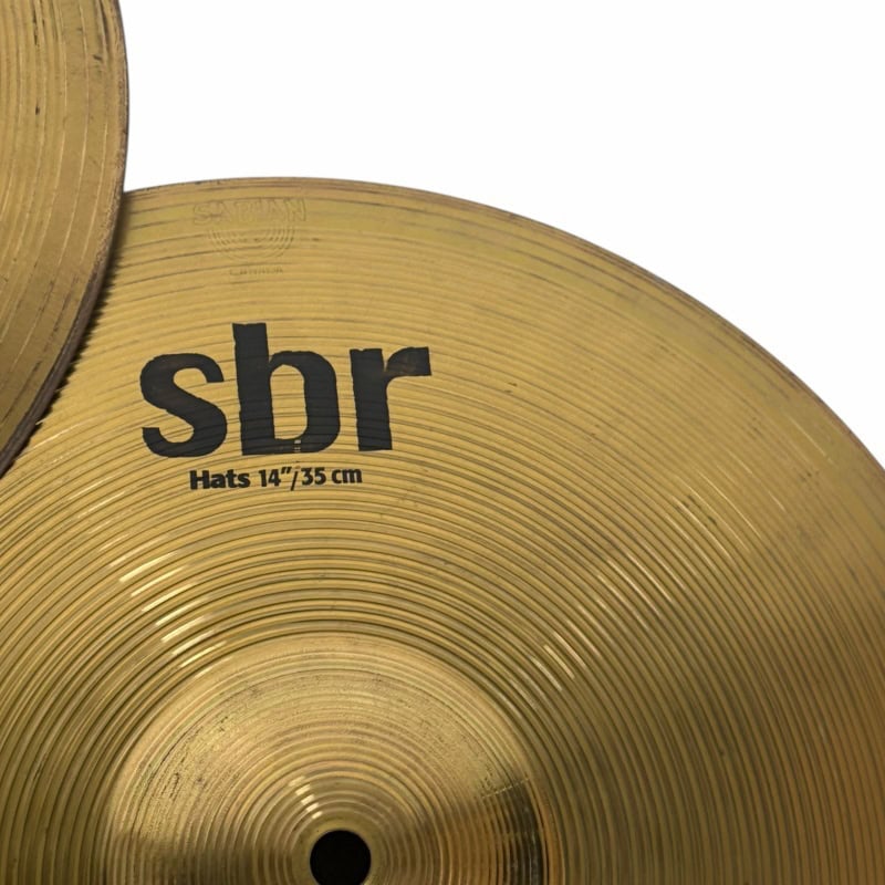 Brass cymbal with "sbr" branding, 14-inch size, ideal for drummers and percussionists.