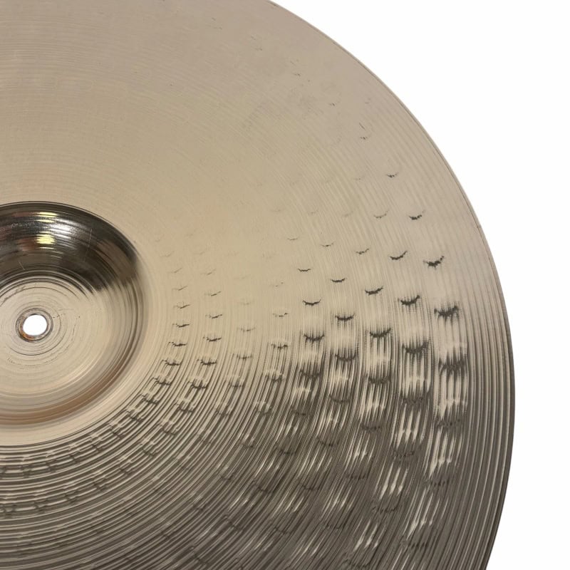 Cymbal from Drummers Only, showcasing intricate grooves and shiny surface. Perfect for drumming enth.