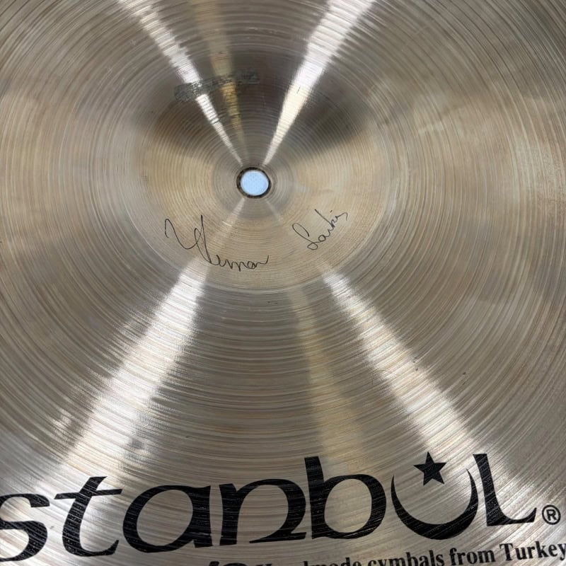 Istanbul Agop 18in Dark Crash cymbal with signatures from drummers.