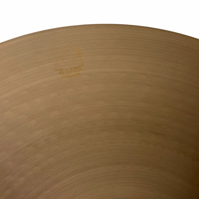 Close-up of a Meinl 16-inch thin crash cymbal showing its surface details.