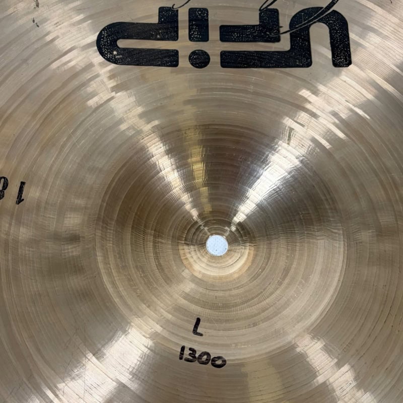 Close-up of UFIP Class Series 18in crash cymbal with logo and markings.