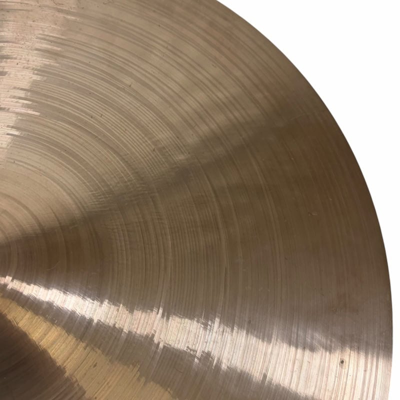 Close-up of Sabian 22in Artisan Ride cymbal with detailed grooves.