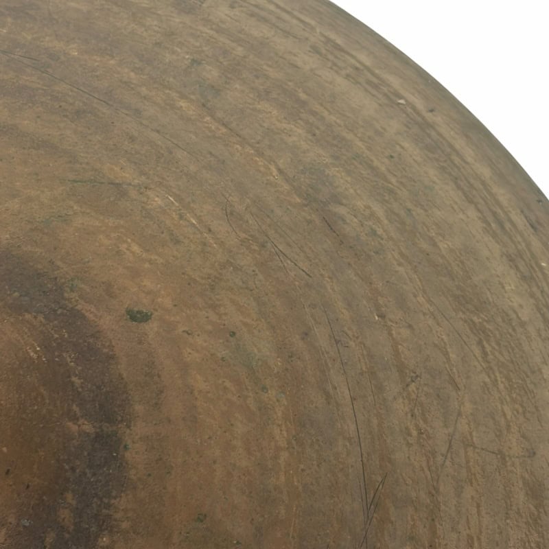 Close-up of a ride cymbal from UFIP Natural Series, showing its textured surface and finish.