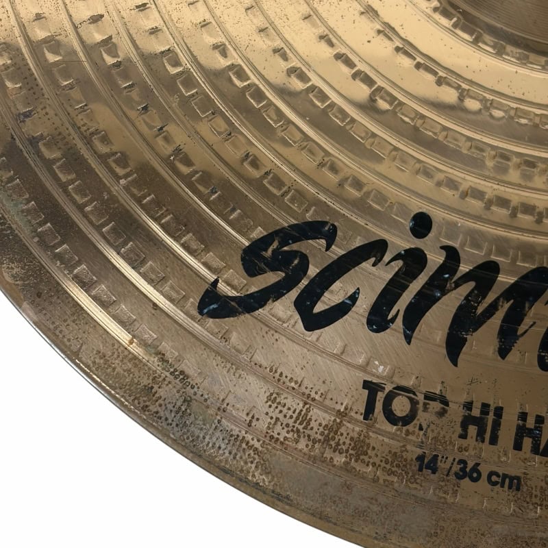 Close-up of Zildjian 14-inch Scimitar HiHats cymbals with detailed grooves.