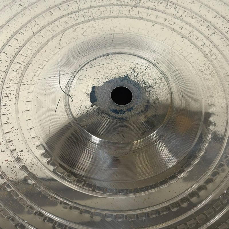 Close-up of Zildjian 14-inch Scimitar Hihats cymbals with detailed surface texture.