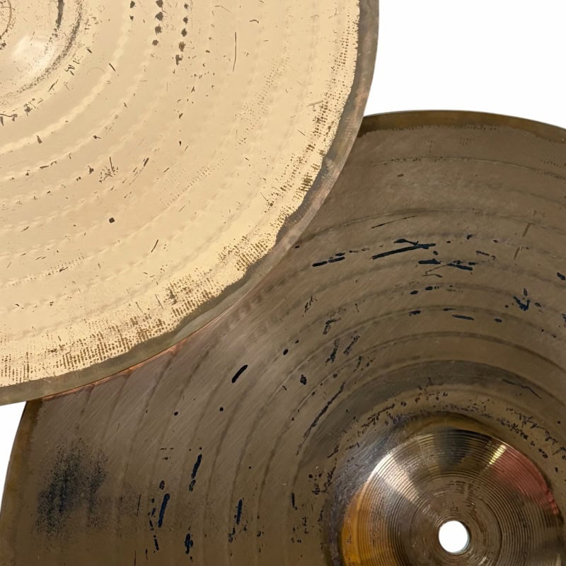 Close-up of Zildjian 14-inch Scimitar Hihats cymbals with detailed surface texture.