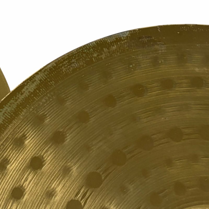 Close-up of Meinl HCS cymbal with detailed surface texture.