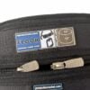 Black drum stick bag with protection racket logo and zippers.