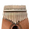 Close-up of Sela Kalimba thumb piano with metal tines and wooden body.