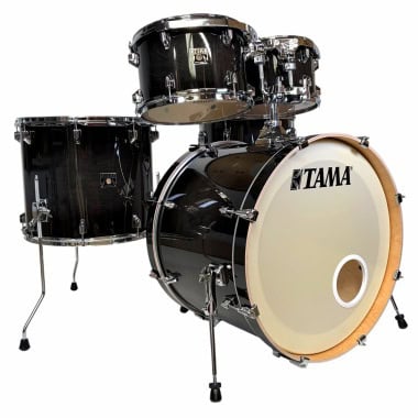 Black Tama drum set with bass drum, toms, and snare for drummers only.